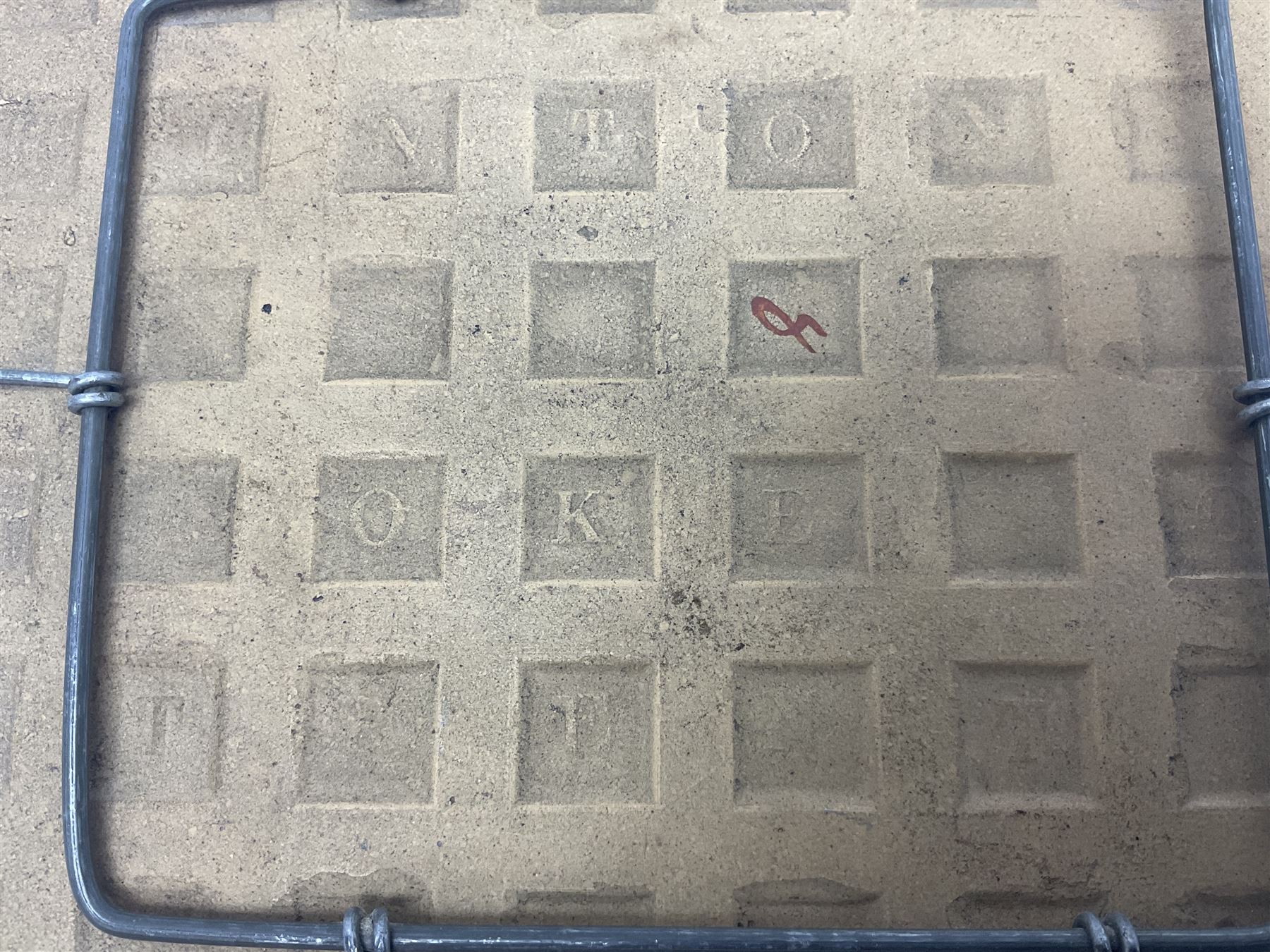 19th century Minton & Co majolica tile, decorated in relief with a bird upon a fruiting branch against a blue ground, with textured ochre border and anthemion to each corner, impressed mark verso, H19.7cm