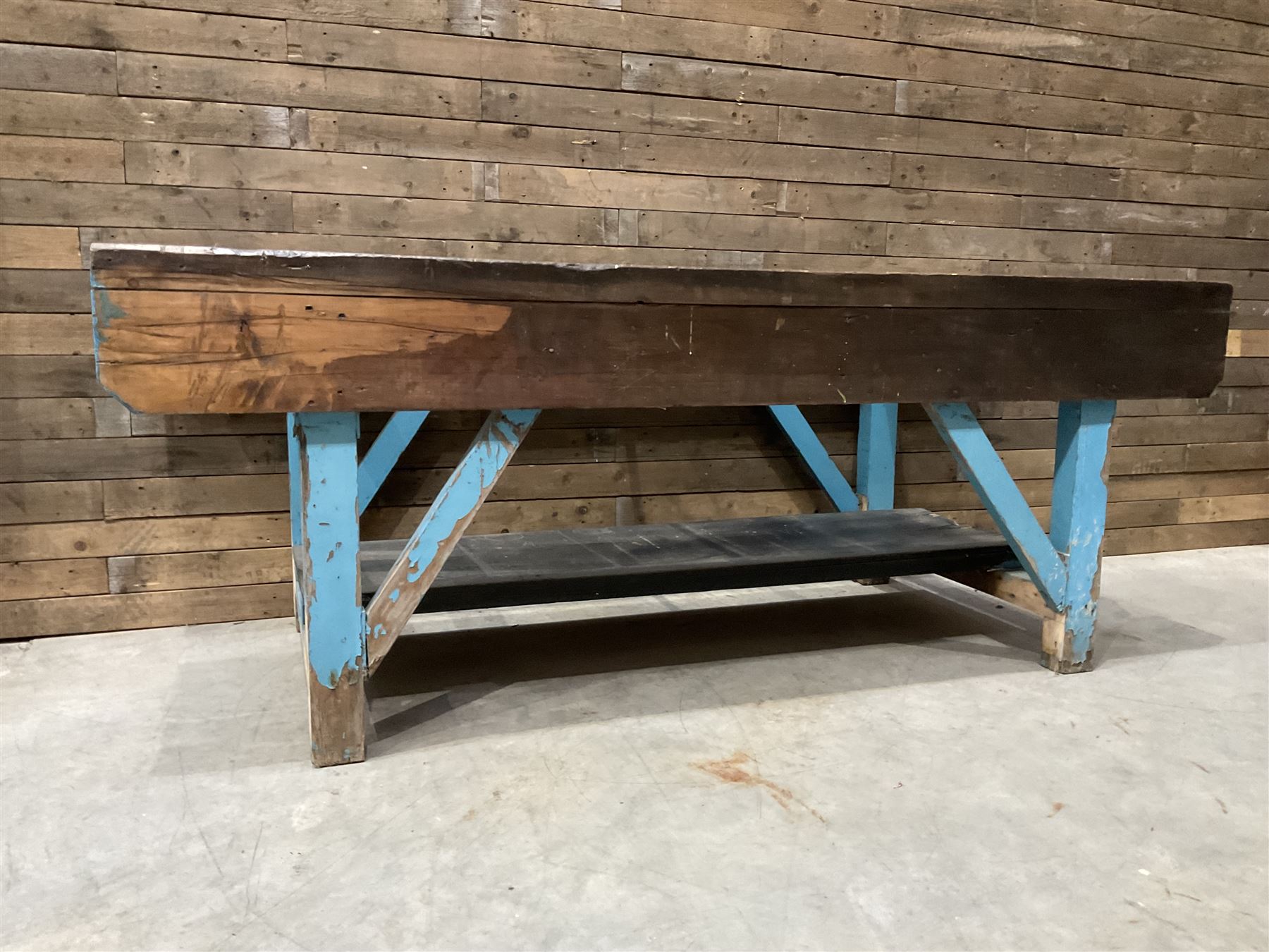 Large timber work bench with central glass section, and two pairs of vintage wooden step ladders (3)