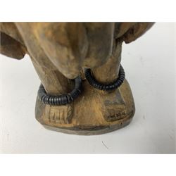 Early 20th century West African Yoruba family wooden figure of Orisha Oko, the god of farming/agriculture, carved from the solid, bears manuscript label of provenance verso H26.5cm