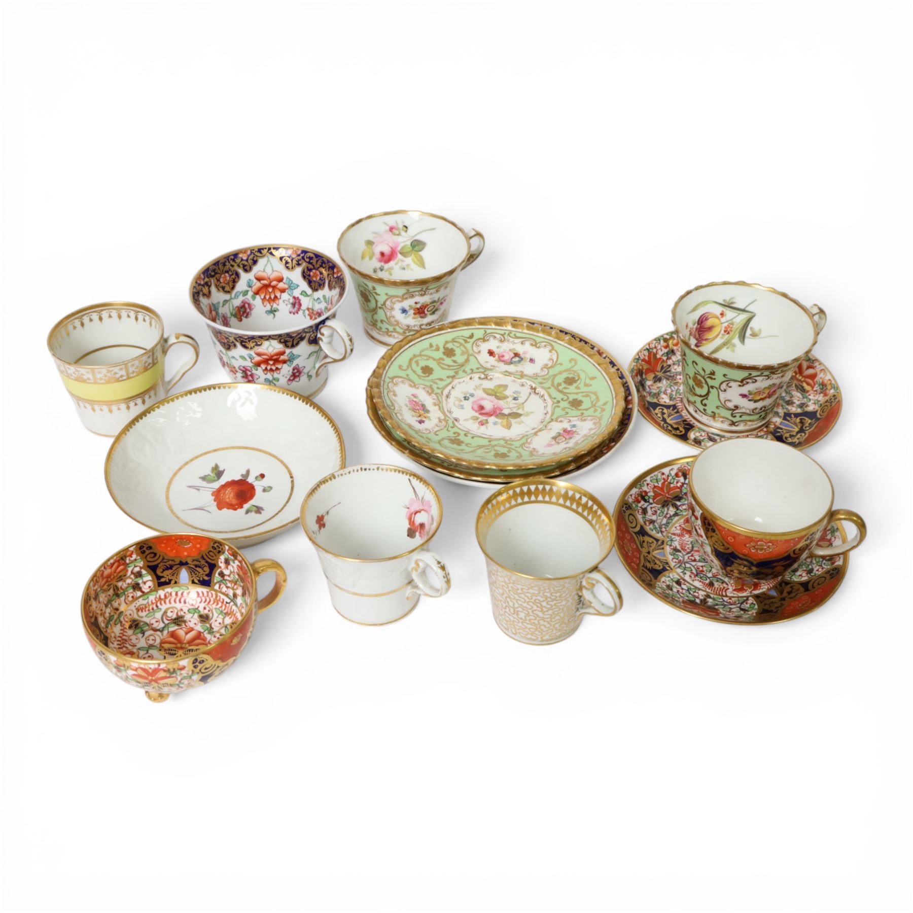 Group of 19th century tea and coffee wares, comprising two Davenport Imari 3545 pattern tea cups and saucer, one example upon three stylised bun feet, H5.5cm, a pair of Chamberlain's Worcester cabinet cups and saucers, hand painted with reserves of floral sprays and sprigs against an apple green ground, H7cm, a large size Chamberlain's Worcester cup and saucer with Imari type decoration and cobalt blue band to rim, H7.5cm, Chamberlain's Worcester cup and saucer with moulded floral band detail, and two further cups