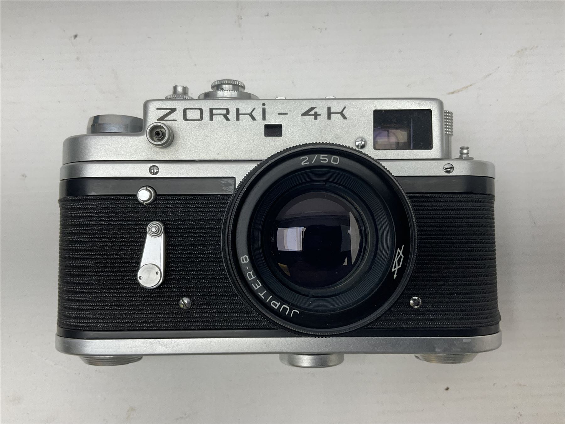 Zorki-4K camera body, serial no 74334713 with 'Jupiter-8 2/50' lens serial no 7454365, Zorki-4 camera body serial no 71012418 with 'Jupiter-8 2/50' lens serial no 0174594, and three other cameras 