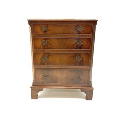 Georgian style 20th century mahogany chest fitted with four drawers, canted corners with blind fretwork decoration, on bracket feet