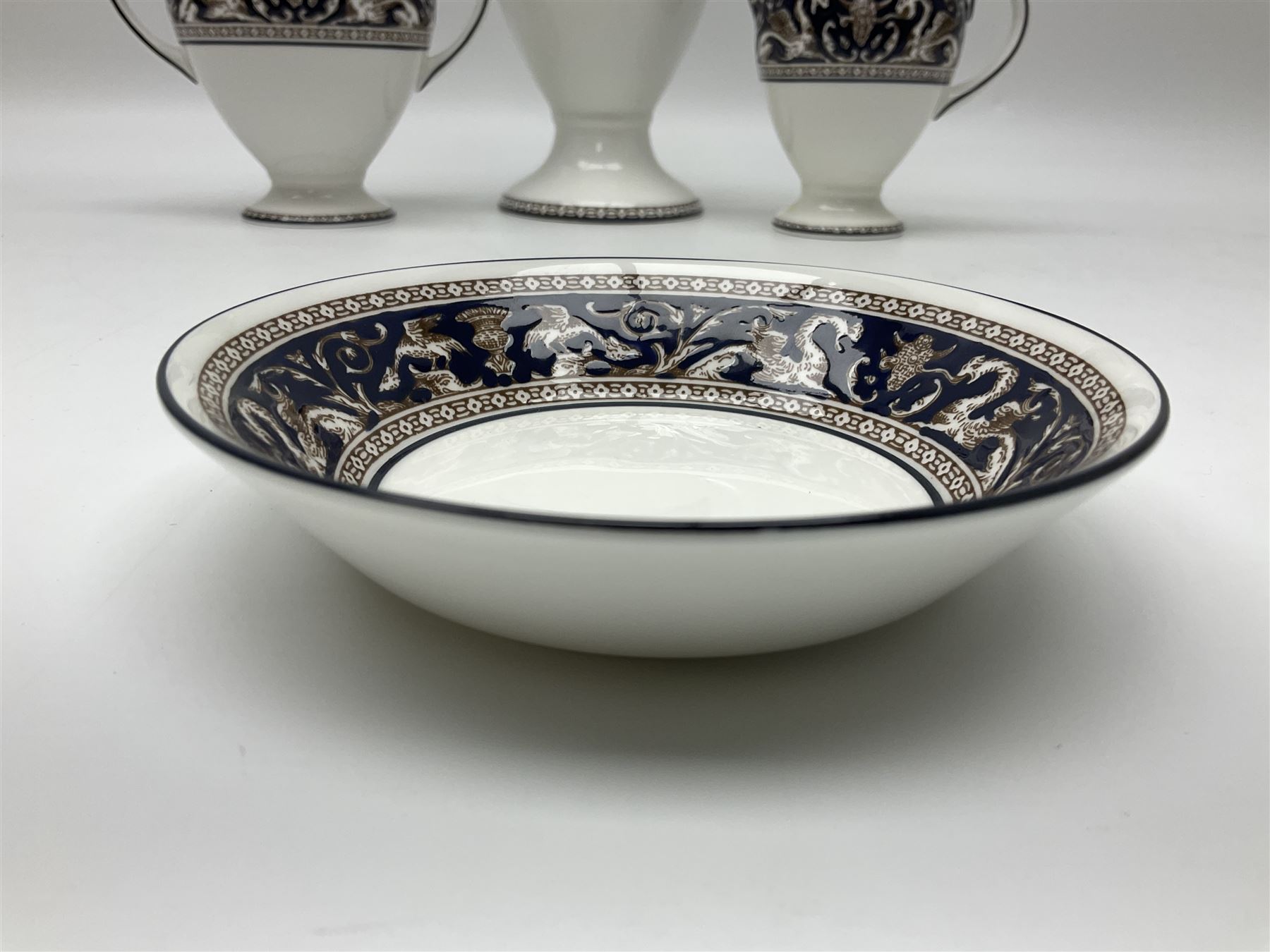 Wedgwood navy Florentine pattern coffee service for six, comprising coffeepot, coffee cans and saucers, milk jug, twin handled covered sucrier and small dish