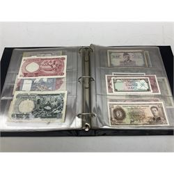 World banknotes, including Queen Elizabeth II The States of Jersey one pound 'DB202703', five pounds 'BB527762' and ten pounds 'AB651481', reserve bank of New Zealand two dollars '1L3 741894', King George V Straits Settlements one dollar 1st January 1935 'F/83 28924', various Bank of England notes etc, housed in two ring binder albums