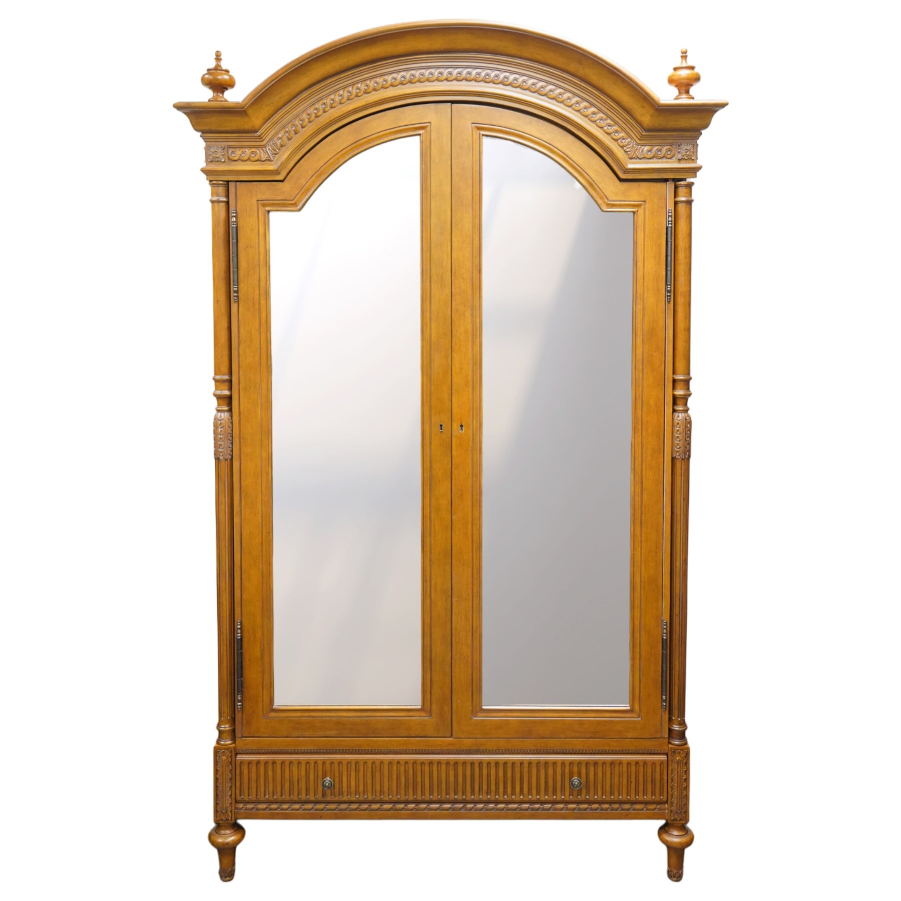 And So To Bed - French design ‘Eclectic’ double wardrobe in light finish, arched moulded cornice with carved foliate band and turned finials, two mirrored doors enclosing a hanging rail, flanked by turned columns with foliate decoration, single fluted drawer below, on turned tapering feet