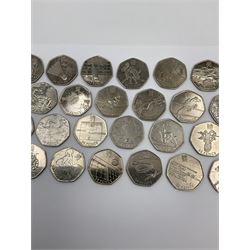 Twenty-nine Queen Elizabeth II Great British fifty pence coins, commemorating the London 2012 Olympic Games, all from circulation