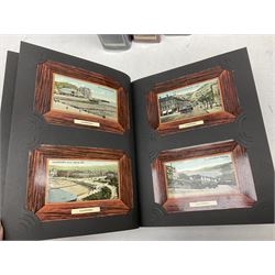 Nine albums containing a large quantity of Edwardian and later postcards, predominantly topographical, mostly printed but some real photographic including street scenes, comic, churches and interiors, novelty pull-outs, postmarks including British Empire Exhibition 1924 and paquebots, some modern reproductions etc (9)