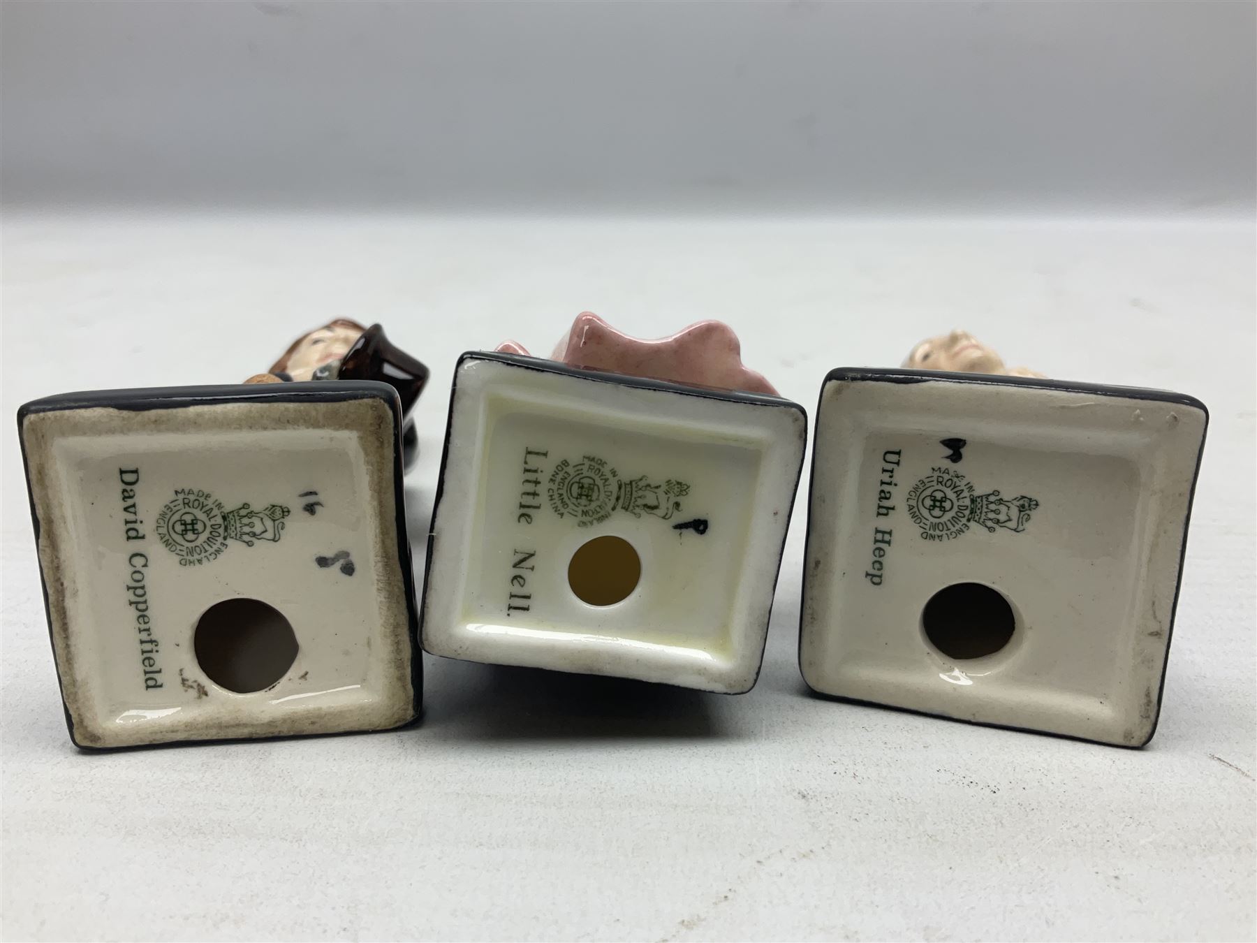 Sixteen Royal Doulton Charles Dickens figures, to include Oliver Twist, Fat Boy, Fagan, Stiggins etc, all with printed marks beneath