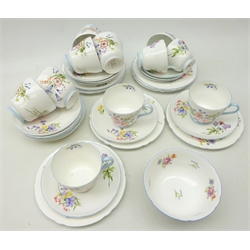  Eight Shelley 'Wild Flowers' pattern trios, three coffee cups and saucers, sugar bowl etc, No. 13668 (38)  