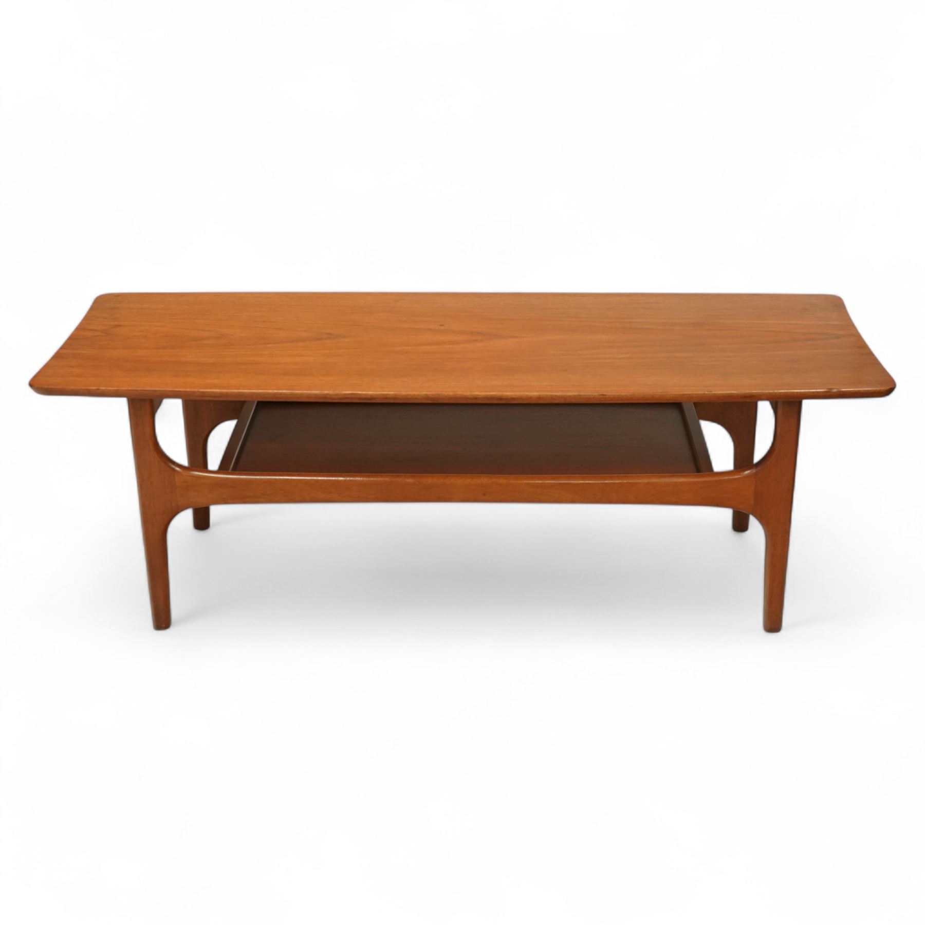 Jentique - Mid-century 'Stingray' teak coffee table, rectangular form with rounded corners, raised on shaped supports united by a magazine under tier 