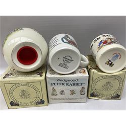 Royal Doulton Bunnykins nursery set in box and two cups, together with two Wedgwood Peter Rabbit mugs and Royal Staffordshire Noddy money box and cup (7)