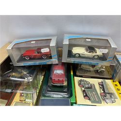 Three Mini-Rama die-cast displays entitled 'Gasoline Station', 'Work Shop' and 'Racing Pit'; all in perspex cases and boxes; and fifteen die-cast models by various makers including Lledo Trackside; Vanguards; Minichamps; Xonex Scooter; Titanic etc; all boxed/packaged (18)