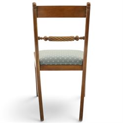 19th century mahogany extending dining table, rectangular top with rounded corners raised on turned and fluted supports with brass cups and castors, with two additional leaves; with set of eight (6+2) Regency design mahogany dining chairs, spiral-reeded back-bar over drop-in seats and sabre supports (W54cm H85cm)