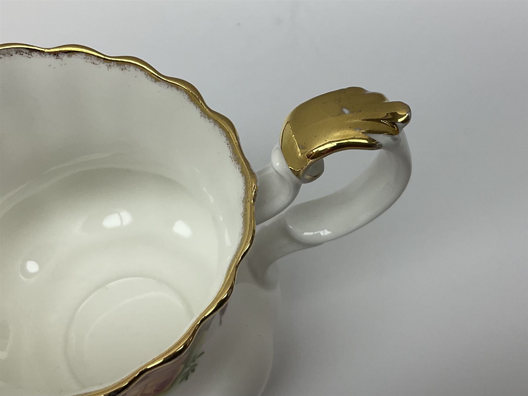 Royal Albert Old Country Roses pattern tea set, comprising teapot, coffee pot, six teacups and six saucers, five side plates, further teacup with joined saucer and side plate, open sucrier, milk jug, cake plate, and preserve pot and cover, together with Royal Albert Jubilee Rose pattern sauce boat and stand, and Royal Albert Lavender Rose pattern cake stand. 