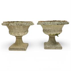 Pair of 20th-century Victorian design cast stone garden urns (2)
