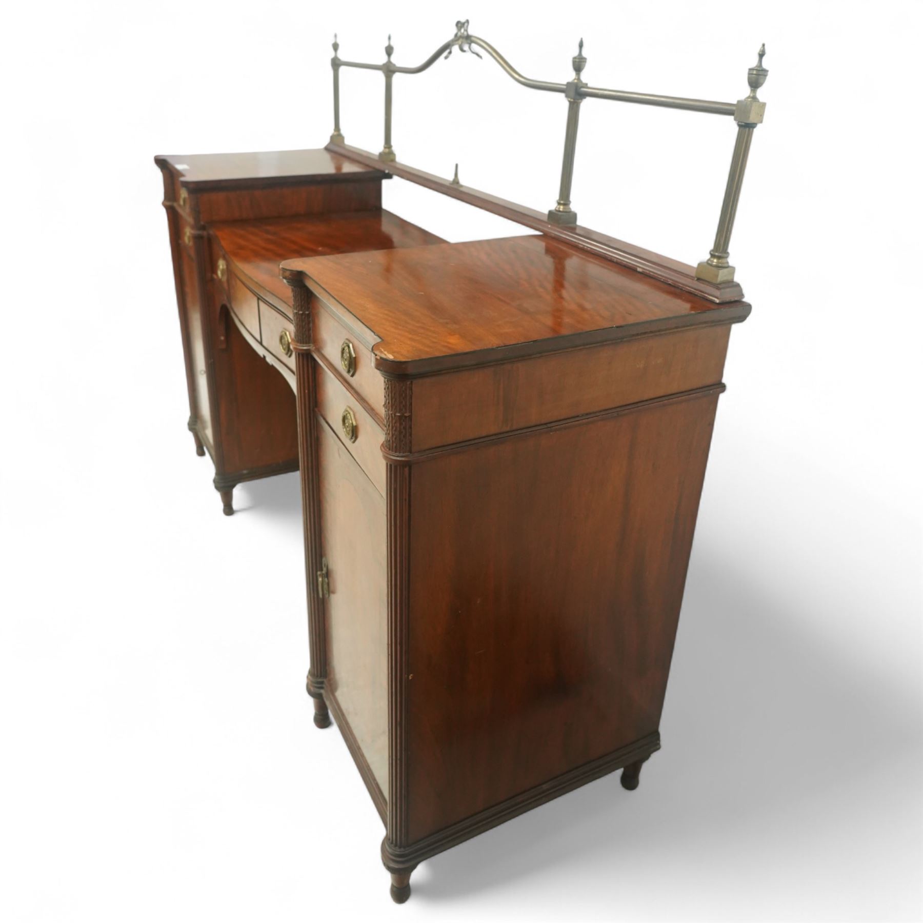 19th century mahogany Hepplewhite design pedestal sideboard or pair of bedside pedestals, each pedestal fitted with two drawers and cupboard, decorated with figured panelled doors and ebony stringing, curled leaf carved mounts over reeded half columns, on turned feet 