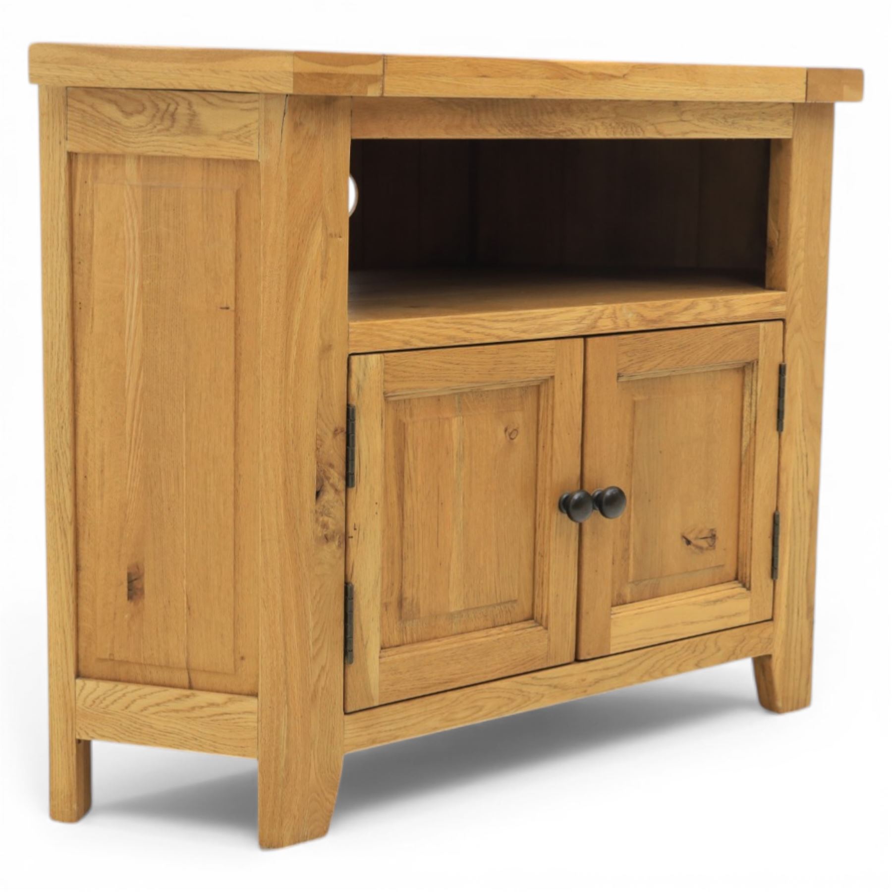 Modern light oak corner television stand, open recess above two cupboard doors with aperture to the back