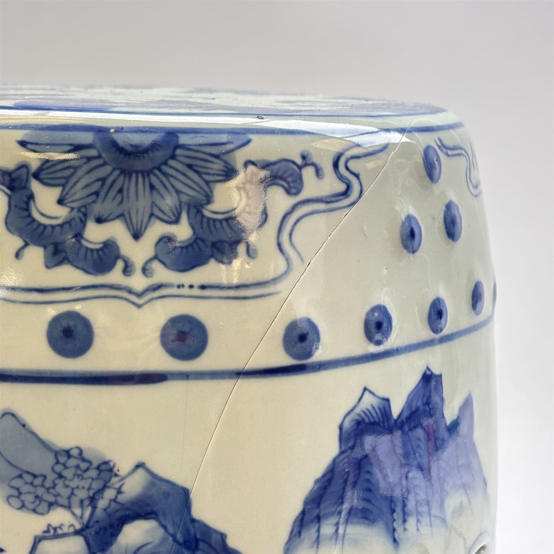 Pair of Chinese blue and white garden stools, decorated with pagodas a landscape, H40cm 