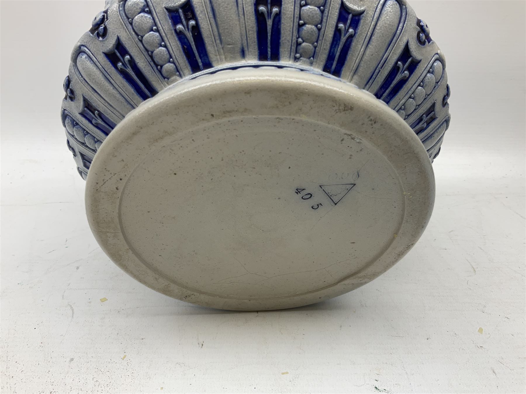 Three jardinières comprising West German Gerz example decorated in relief, Doulton Slaters example with frilled everted rim and a majolica example, and a further two Arthur Wood majolica jugs (5)