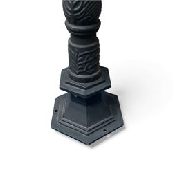 Victorian-style cast iron lamp post in a black finish,