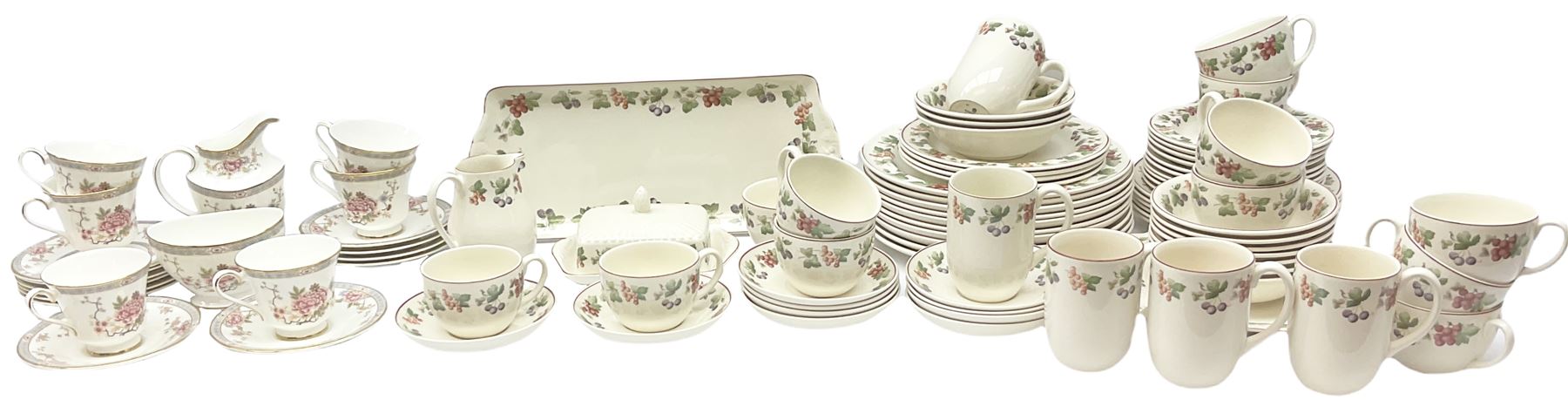 Wedgwood Queens Ware tea and dinner wares in Provence pattern, including ten cups and saucers, milk jug, butter dish with cover, ten dinner plates, ten bowls and ten side plates etc (71), together with Royal Doulton tea wares in Canton pattern, comprising six cups and saucers, milk jug, open sucrier and six dessert plates.    