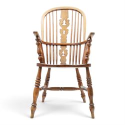 19th century elm Windsor armchair, with central pierced splat, flanked by spindles, dished seat, raised on turned supports united by H-stretcher