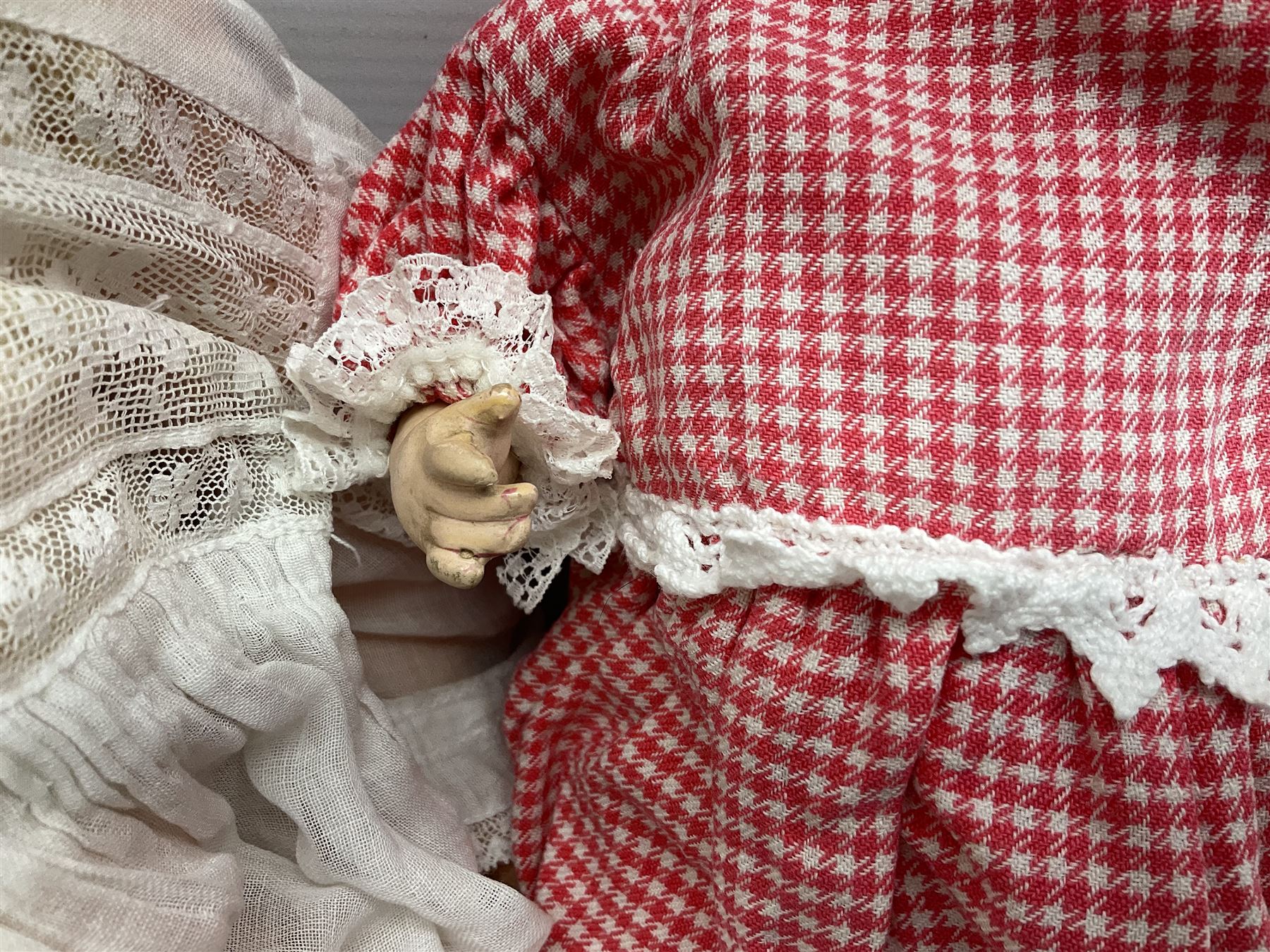 Heubach Koppelsdorf Germany bisque head doll with applied hair, sleeping eyes, open mouth with teeth and composition body with jointed limbs; marked 'Heubach Koppelsdorf 342.6/0 Germany' H34cm; Armand Marseille bisque head baby doll with moulded hair, sleeping eyes, open mouth and composition body with jointed limbs; marked 'A.M. Germany 351./8.K.; and BND London all composition doll (3)