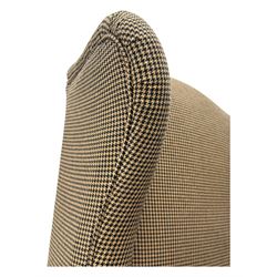 Hardwood-framed wingback armchair, upholstered in dog tooth pattern fabric, on cabriole supports 