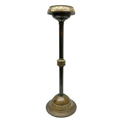  Daalderop of Holland brass and copper smokers stand, upon a circular base, with geometric patterns, with impressed mark to the base, H74cm