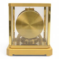 Jaeger-LeCoultre Atmos Clock - Caliber 528-6, 
gold-plated brass with glass panels, 15 jewel movement with atmospheric bellows winding motor, serial number 161881, circa 1960s, with engraved presentation plaque for W.W. Clayton, Canton Golf Club, 1964, in maker's box with instruction booklet, minute hand detached, H23.5xW21xD16cm