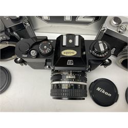 Nikkormat FT2 camera body, serial no. 5066813, in original packaging, together with Nikkormat EL camera body, serial no. 5577358, with Nikon Nikkor 50mm 1:1.8' lens no. 2143575, Nikkormat FT, serial no. 3968385, and Nikomat FT camera body, serial no. 4015491