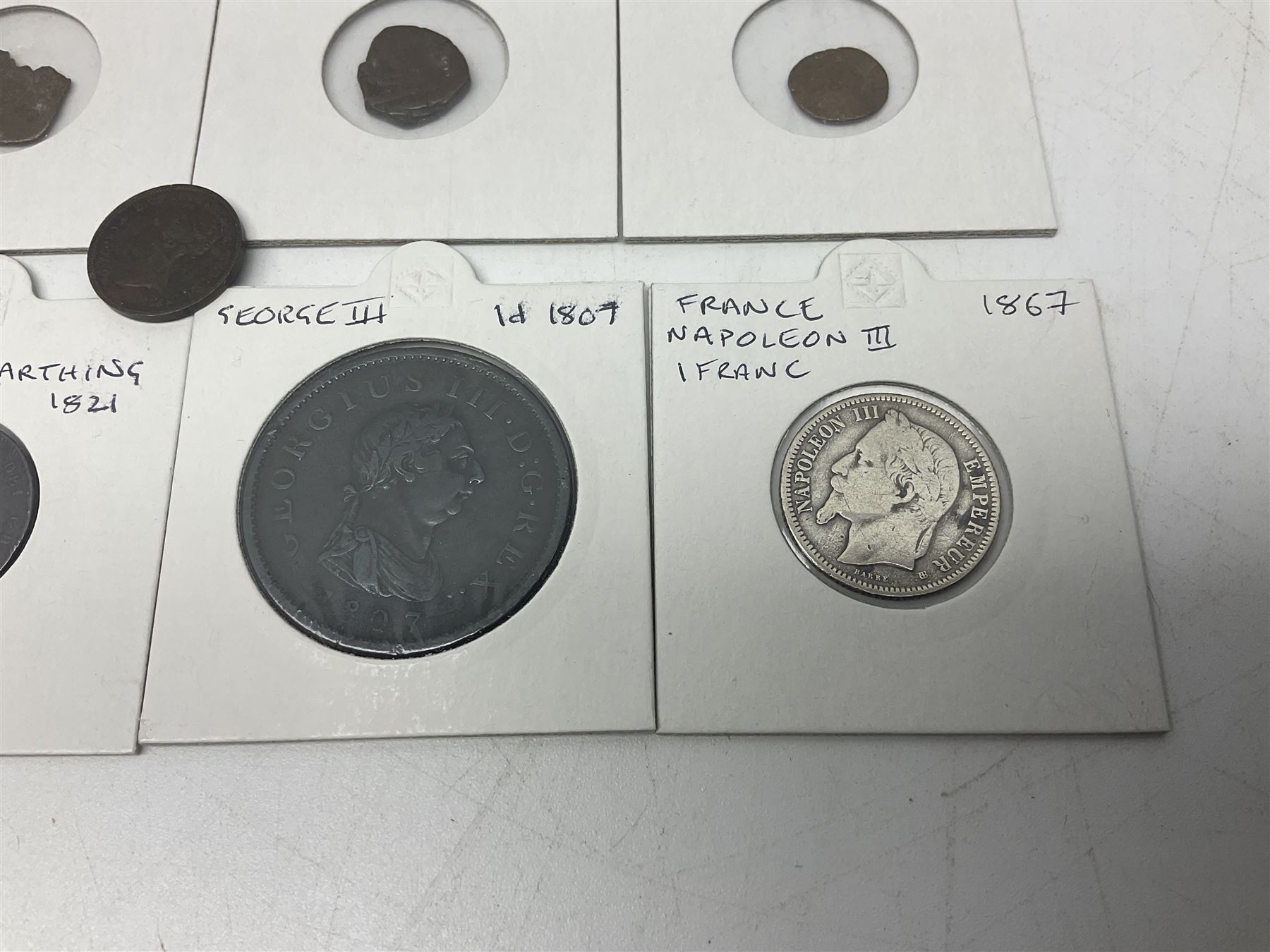 Coins including George III 1807 penny, George IV 1821 farthing, France Napoleon III 1867 one franc etc