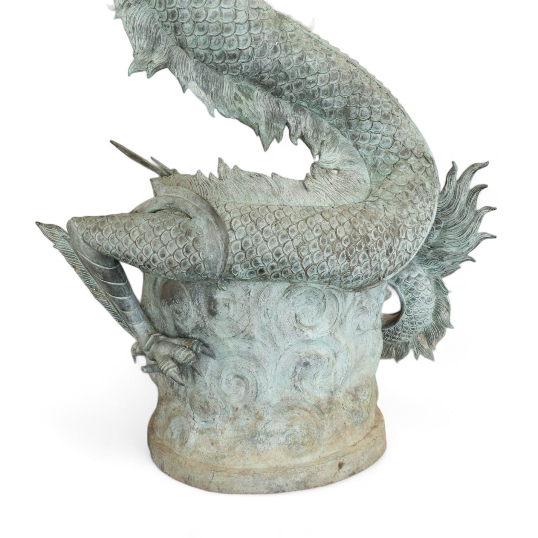 Verdigris hand finished cast brass Chinese Dragon garden centre-piece fountain, scaled dragon with gaping jaw holding an orb, curled tail on wave cast base