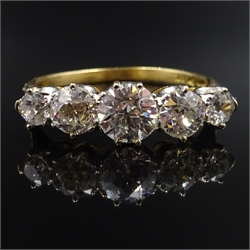  Five stone graduating diamond ring, diamond set shoulders, stamped 18ct Plat, central diamond approx 0.8 carat  