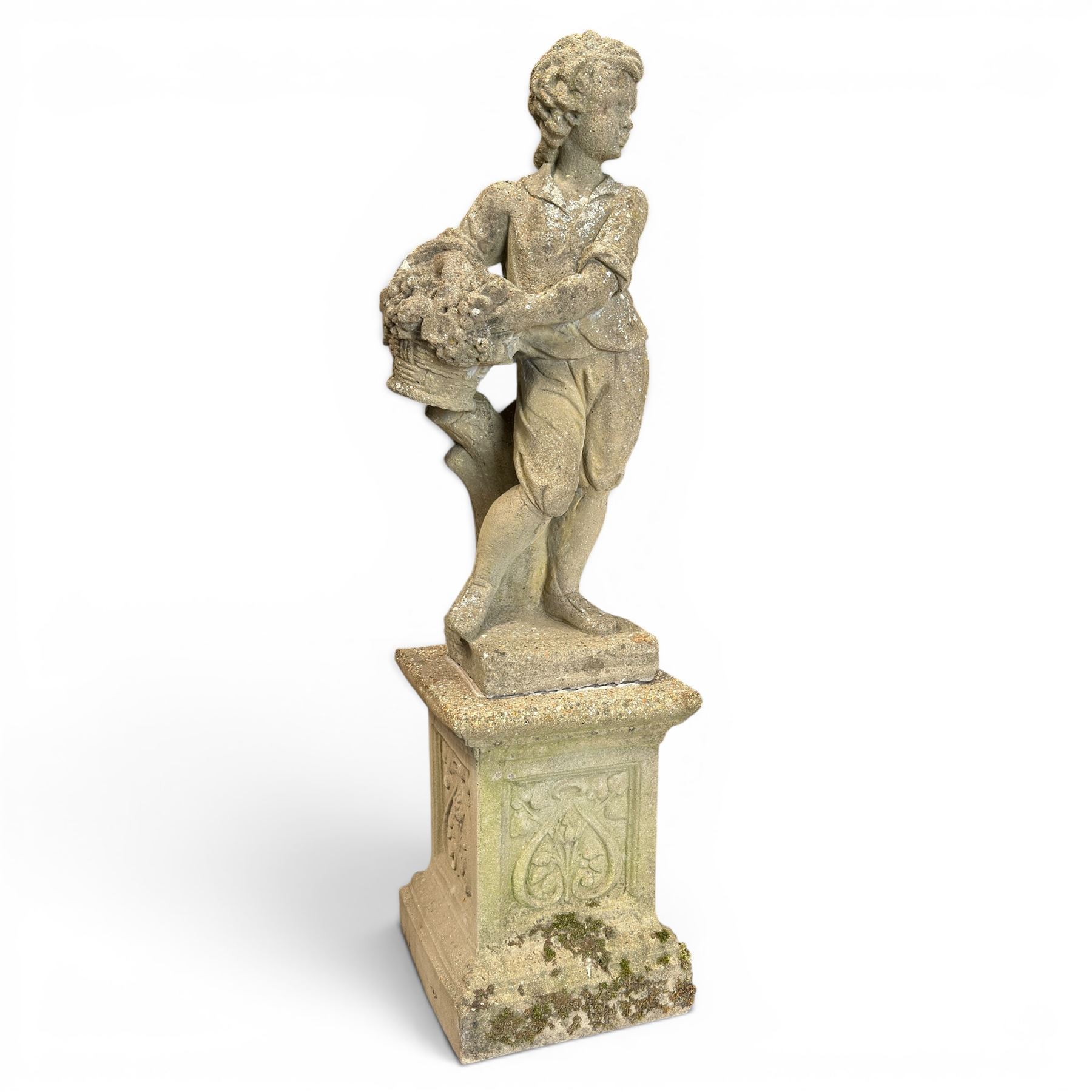 Weathered cast stone statue of a child and urn planter on pedestal along with three piece bird bath