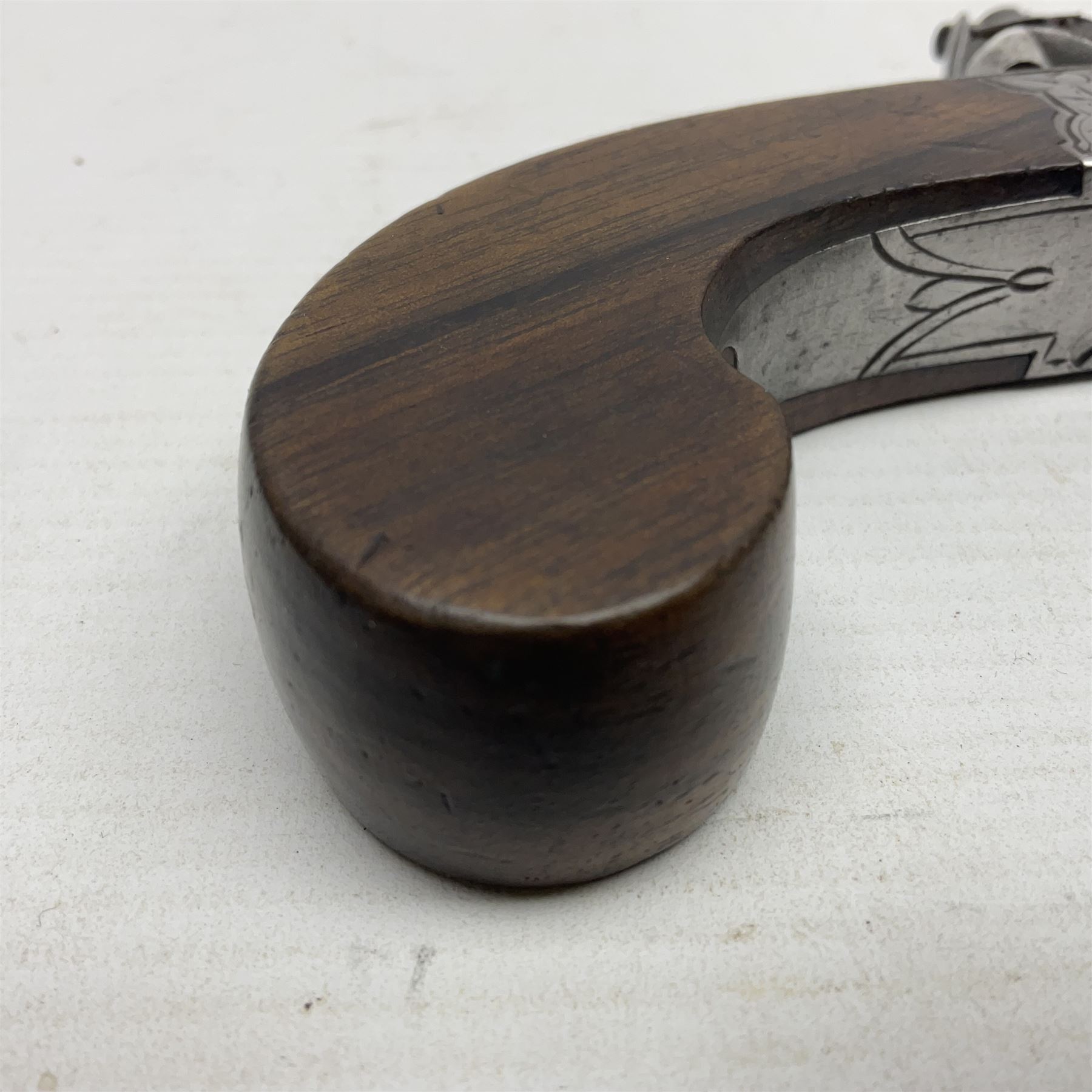 Early 19th century J. Calvert (Leeds) flintlock single barrel tap action pocket pistol, approximately .45 cal., the 4cm (originally) screw off barrel with top safety and walnut stock L16cm overall