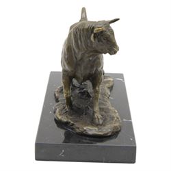 Bronze figure, modelled as a prancing bull, upon a naturalistic base signed Mils and with foundry mark, raised upon a rectangular marble base, overall H14cm