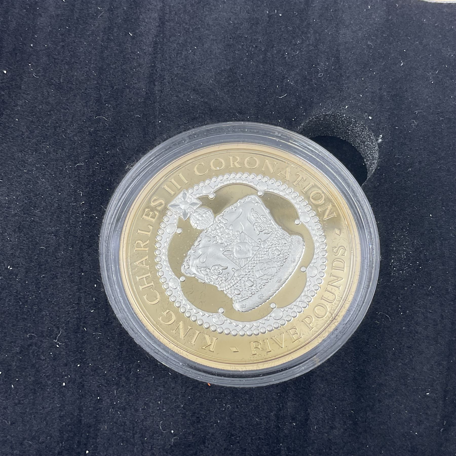 King Charles III 2023 'Coronation Silver Proof Mint Masters Set' comprising Bailiwick of Jersey, Bailiwick of Guernsey and Isle of Man sterling silver proof five pound coins, cased with certificate and Queen Elizabeth II 2019 Bailiwick of Jersey 'Remember With Us' silver two pound and five pound pair, cased with CPM certificate