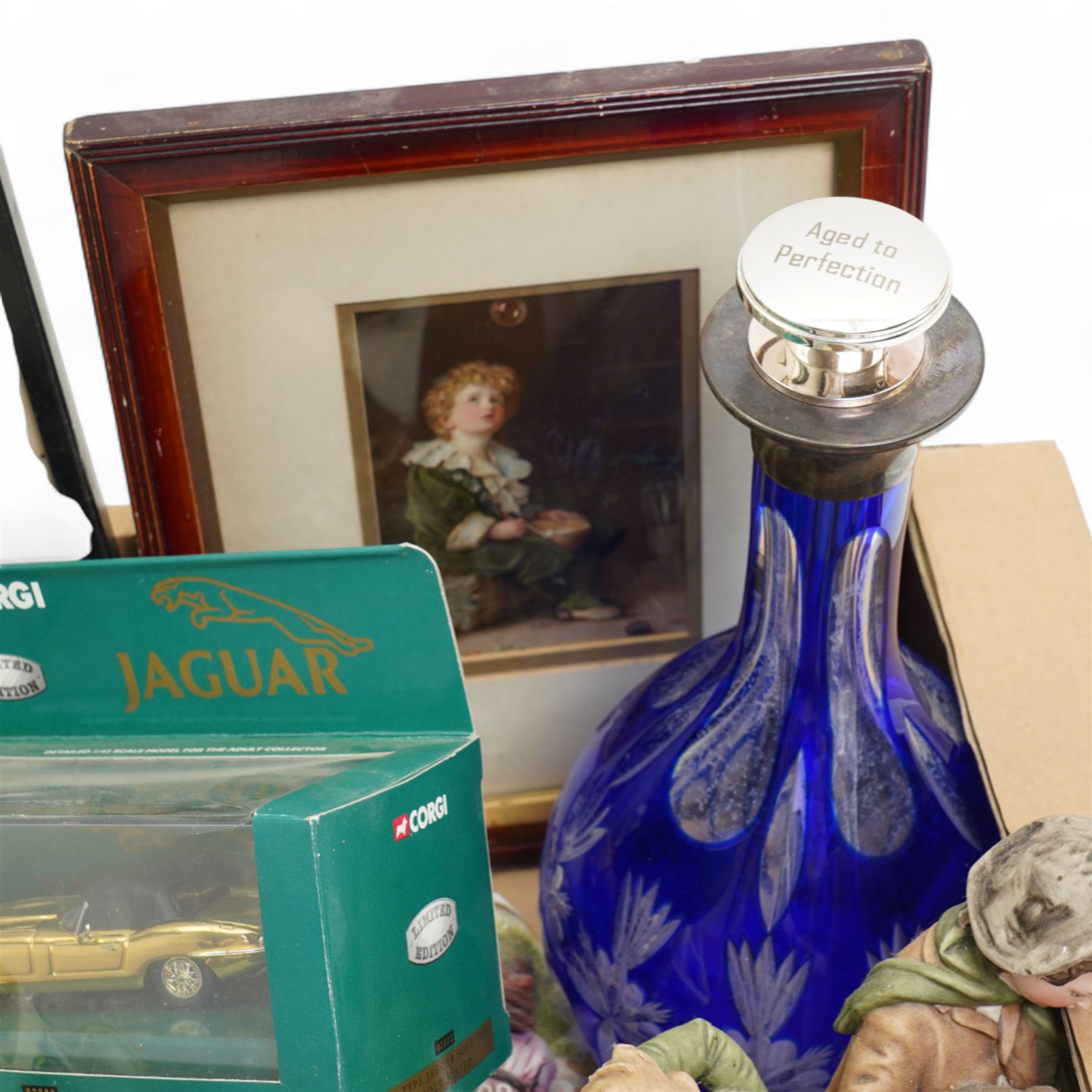 Franklin Mint Romeo and Juliet candlesticks, together with a collection of glass, model cars, bisque figures etc