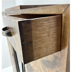 Art Deco walnut display cabinet, central astragal glazed door flanked by two drawers and two cupboards 