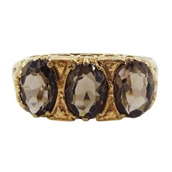 9ct gold three stone oval smoky quartz ring, with pierced heart design gallery, London 1972