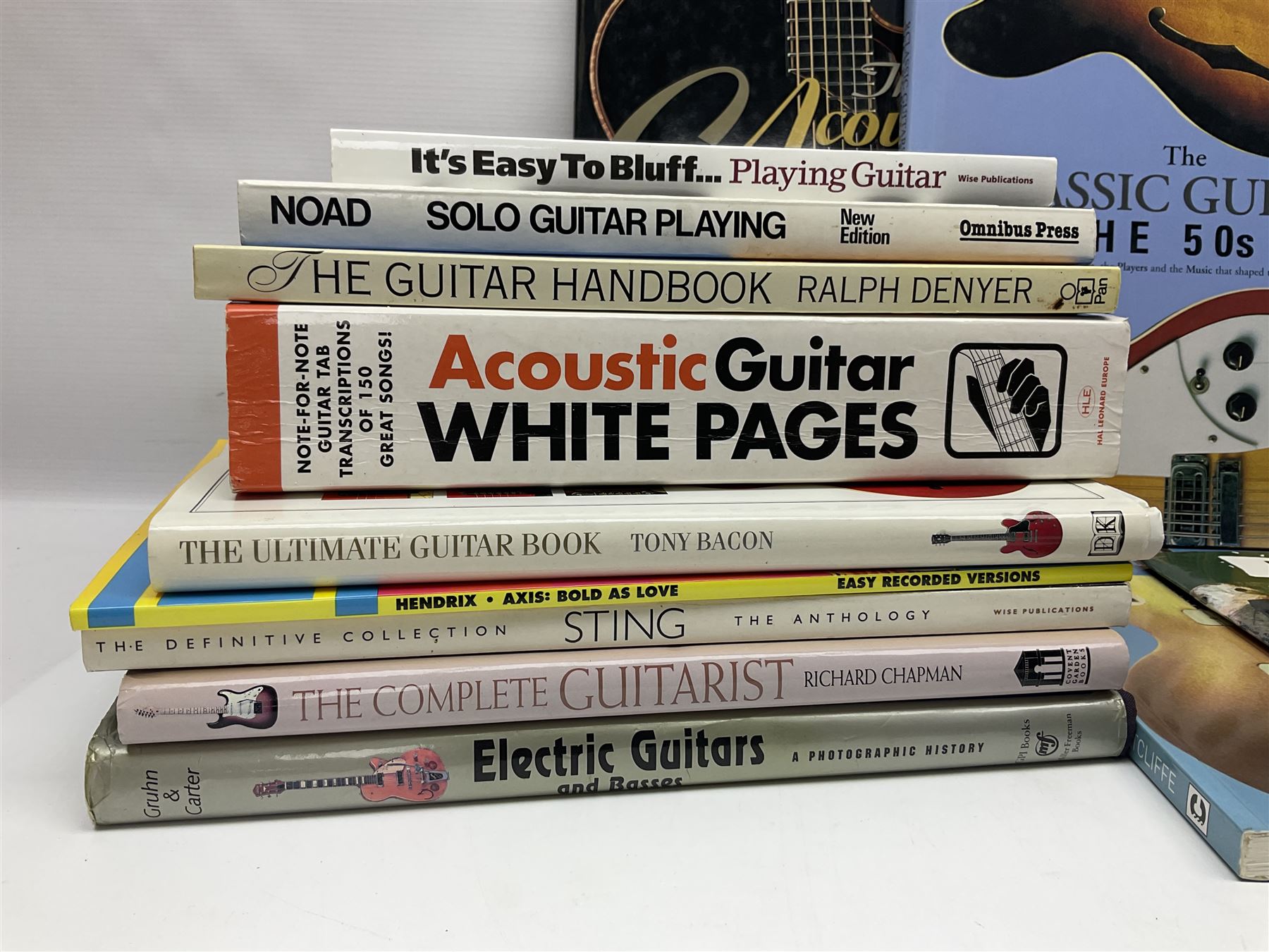 Seventeen modern books on guitars and guitar playing including The Classic Guitars of the 50s and 60s; The Acoustic Guitar by Freeth & Alexander; Electric Guitars - An Illustrated History by Jonathan Lister; Electric Guitars and Basses by Gruhn & Carter; Acoustic Guitar White Pages; The Ultimate Guitar Book by Tony Bacon etc