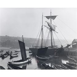 After Frank Meadow Sutcliffe (British 1853-1941): Cobles and Fishing Vessels Dock End Whitby, one off black and white hand-finished photographic print pub. Sutcliffe Gallery 40cm x 50cm