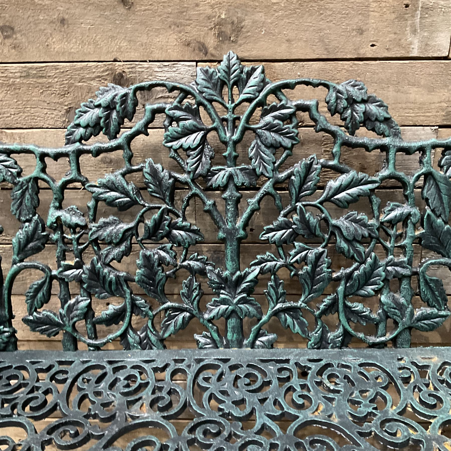 Victorian design heavy cast iron garden bench, ornate shaped back with rope twist and ramshead arms H88cm, W100cm