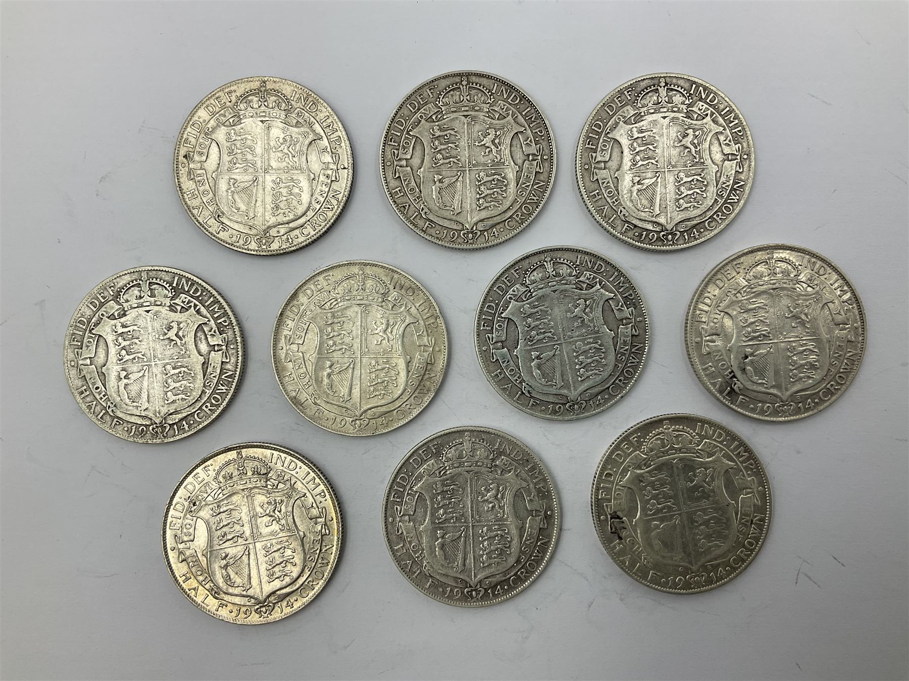 Ten King George V 1914 silver half crown coins