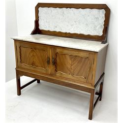 Early 20th century mahogany washstand, raised marble backsplash and top above two cupboards, square supports joined by stretchers