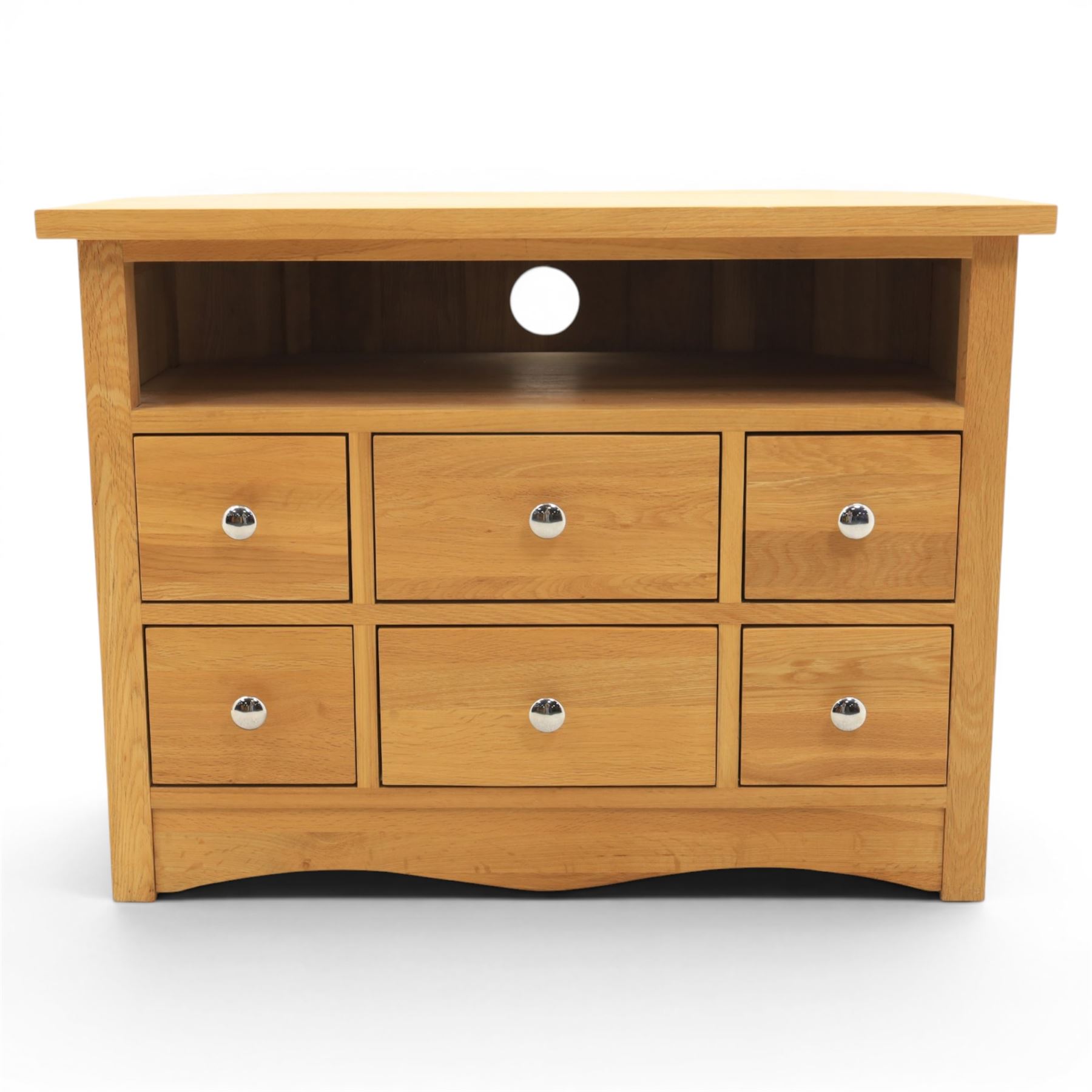 Modern oak living room set comprising; a small side cabinet, corner TV stand and coffee table, cabinet with single drawer and cabinet, finished with metal handles (H 80cm, D 32cm, W 80cm), TV stand with open recess and rear aperture for wires, above nine drawers with chrome pulls (H 62cm, D 50cm, W 84cm)  coffee table with curved edges and full length undertier (H 50cm, D 60cm, W 90cm)  