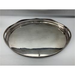 Pair of Mappin and Webb silver plate pierced pedestal bon bon dishes, together with other silver plate comprising teapot stand engraved with lion's head to centre, two cut glass claret jugs, two bottle coasters with acorn decoration, two open salts upon dolphin mounts, tea caddy, three piece cruet set and a large oval tray with pierced sides and upon four ball feet