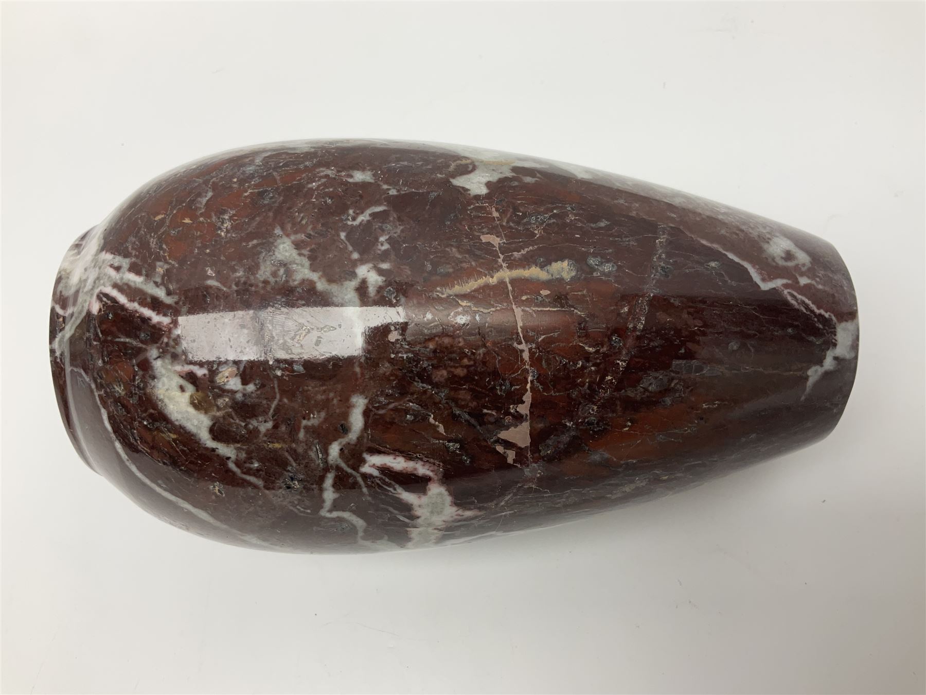 Red marble vase, of baluster form, H18cm