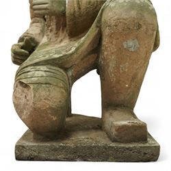 Two near life-size terracotta warrior figures, modelled in the style of the Qin dynasty soldiers, each kneeling with one arm raised, wearing detailed armour and tunics, one example partially damaged and lacking sections